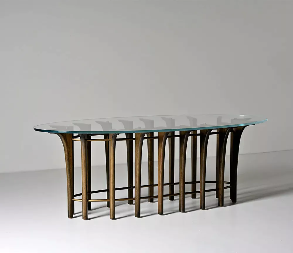 Modern cocktail table inspired by flying buttresses designed for AbnerHenry by Calvin Mai